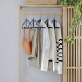 The Slim Kangaroo™ Hanger 40-Pack - Made in Wisconsin, USA with 100% recycled material - The patented design clips in pants, shirts, straps, tanks, jackets and even entire outfits on a single hanger