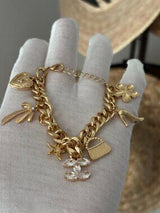 ✨ Glam Gold-Tone Charm Bracelet with Crystal Accents ✨
