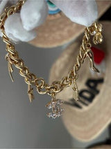 ✨ Glam Gold-Tone Charm Bracelet with Crystal Accents ✨