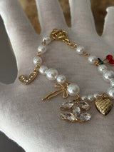 NWT Gold-Tone & Faux Pearl Charm Bracelet with Crystal CC & Cherries 🍒💎