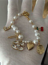 NWT Gold-Tone & Faux Pearl Charm Bracelet with Crystal CC & Cherries 🍒💎