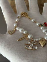 NWT Gold-Tone & Faux Pearl Charm Bracelet with Crystal CC & Cherries 🍒💎