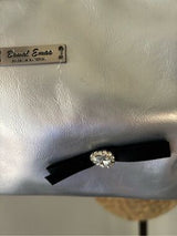 Step into the spotlight with this stunning metallic silver shoulder bag! 🌟 This