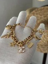 ✨ Glam Gold-Tone Charm Bracelet with Crystal Accents ✨
