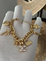 ✨ Glam Gold-Tone Charm Bracelet with Crystal Accents ✨
