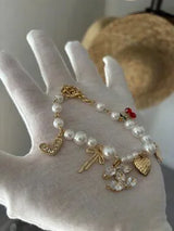 NWT Gold-Tone & Faux Pearl Charm Bracelet with Crystal CC & Cherries 🍒💎