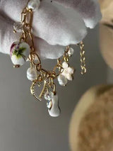 NWT Gold-Tone Whimsical Charm Bracelet w/ Ceramic Rainbow & Floral Beads 🌈🌸