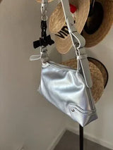 Step into the spotlight with this stunning metallic silver shoulder bag! 🌟 This